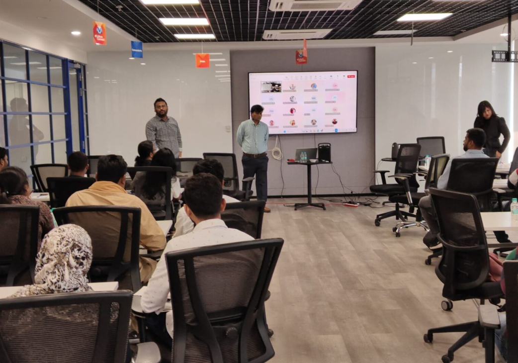 Coaching professionals in a workshop, 2016